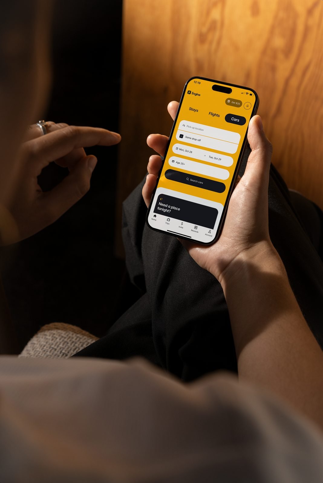 Engine app on a phone showing a car rental search at Minneapolis–Saint Paul airport